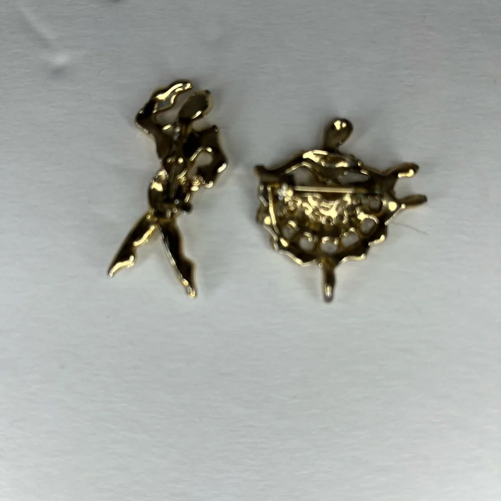 GOLD TONE AND RHINESTONE DANCING BROOCHES - MULTICOLOR DANCERS.‎